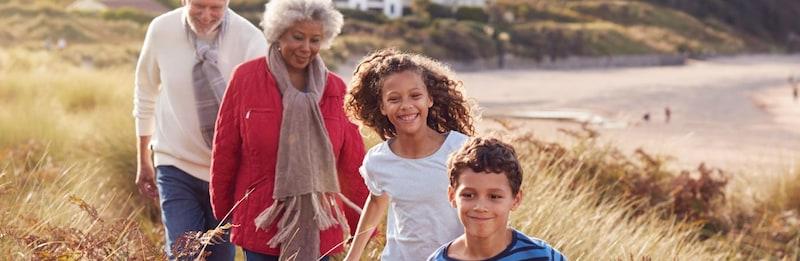 Family walking on the beach